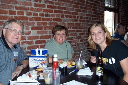 Alumni gathering before a baseball event.